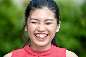 Wall Mural - Laughing Youthful Diverse Girl