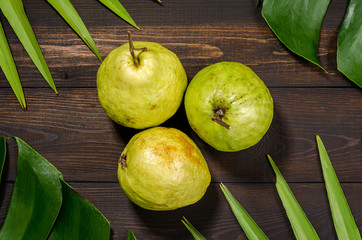 Guava on a green background.