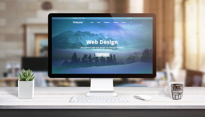 Poster - Modern web design page on computer display. Concept of web design studio work desk.