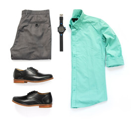 Wall Mural - Men fashion casual outfits for man clothing set with green shirt, watch, trousers and black shoe isolated on white background, Top view