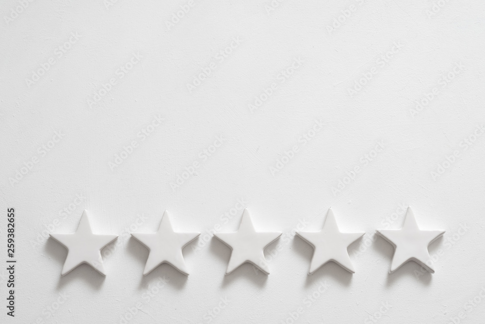 Customer experience. Service rating and review. Assessment survey. Five star shapes. Copy space on white background. - obrazy, fototapety, plakaty 