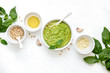 Pesto sauce with ingredients, overhead view