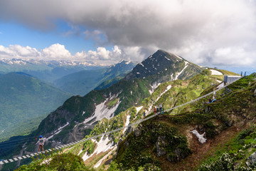 Wall Mural - Suspension bridge over a precipice in the mountains. Sochi Russia