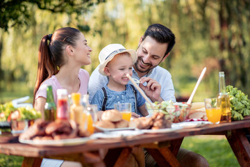 Poster - Happy family having a barbecue