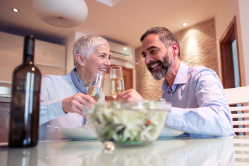 Sticker - Romantic mature couple enjoying  lunch at home