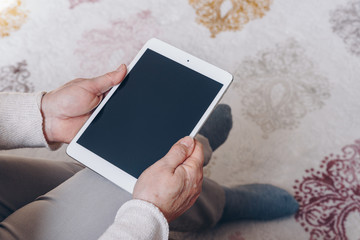 Senior woman using tablet