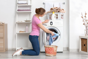 Sticker - Young woman doing laundry at home