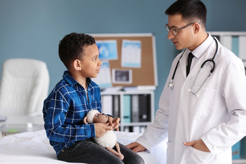 Sticker - African-American boy at pediatrician's office