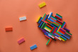 © Pixel-Shot - Brain composed from colorful blocks on color background