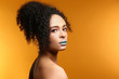 © Pixel-Shot - Portrait of beautiful African-American woman with unusual makeup on color background