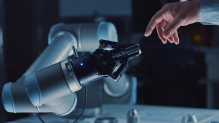 Leinwandbilder - Futuristic Robot Arm Touches Human Hand in Humanity and Artificial Intelligence Unifying Gesture. Conscious Technology Meets Humanity. Concept Inspired by Michelangelo's Creation of Adam