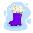 © Oleksandr Rozhkov - Colored rubber boot with flowers inside on a colored background. The concept of spring and flowering nature. Vector illustration