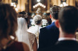 © sonyachny - golden crowns on couple bride and groom in church during wedding ceremony, religion traditions