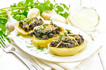 Wall Mural - Potatoes stuffed with mushrooms on white board