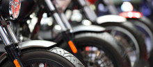 Closeup Of Motorcycles Front Wheel Parked In Exhibition