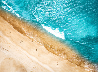  Aerial photo of summer beach and blue ocean with sky. 