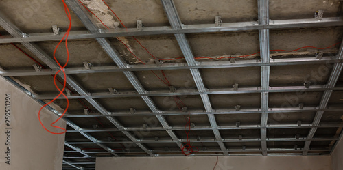 Install Metal Frame For Plaster Board Ceiling At House Under