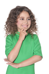 Sticker - Cute little girl posing in green dress isolated on white background