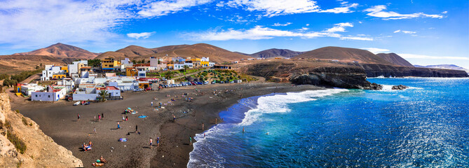 Wall Mural - Fuerteventura - picturesque traditional fishing village Ajui, with black beach. Canary islands
