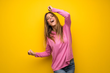 Wall Mural - Happy pretty young blonde woman