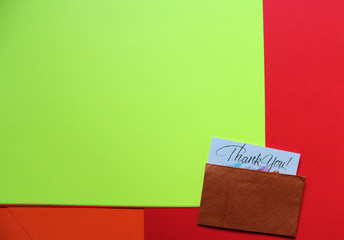 colored paper background with envelope and card. Colored paper sheets for backgrounds, banners and banners.