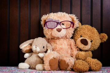 teddy bear shows how to wear a patch to correct amblyopia; children with lazy eye can identify with 