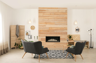 Living room interior with decorative fireplace in wooden wall