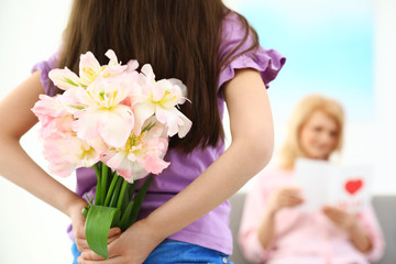 Sticker - Little daughter congratulating her mature mom at home, closeup. Happy Mother's Day