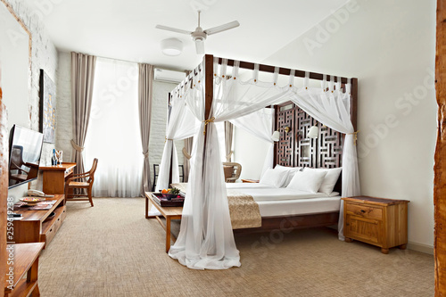 Luxurious Modern Bedroom Interior With Canopy Bed Buy This Stock