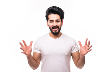 Screaming shocked bearded arab man in casual looking camera and screaming isolated over white background