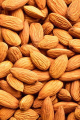 Poster - Top view of almonds, almond texture background, dry fruits, wallpaper