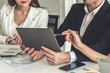 © InfiniteFlow - Businessman is in meeting discussion with colleague businesswomen in modern workplace office. People corporate business team concept.