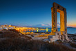 View of Portara and remains of temple of Apollo at sunset.
