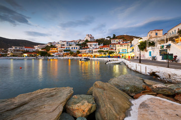 Wall Mural - Batsi village on the coast of Andros island in Greece.