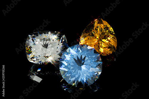 Fotomural Three portuguese cut topazes on black glossy background.