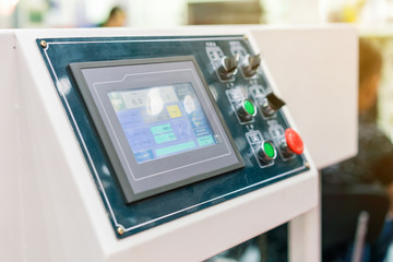 Close up monitor and many push button of control panel for modern and high technology of automatic publication or printing machine