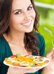  happy smiling woman with salad, outdoor