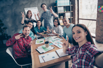 Self-portrait of nice stylish attractive cheerful business sharks executive managers company staff team-building showing v-sign at industrial interior workplace station