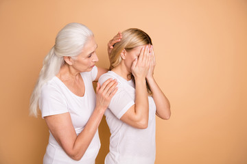 Canvas Print - Portrait of nice attractive gloomy grumpy moody worried ladies wearing white outfit granny mom supporting grandchild cheering up sorrow isolated over beige pastel background