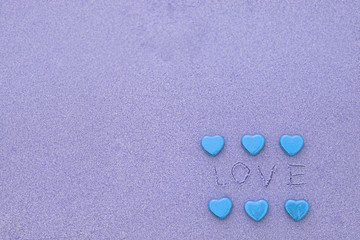 Wall Mural - Chocolate color Lovely Blue heart on the beach. Background is a natural in real place, creative Valentine's Day Concept, tropical style background made in Phuket, Thailand.