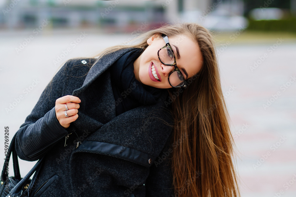 portrait of a happy young girl in glasses face of a girl in transparent glasses young woman smiling on the street portrait of a cute girl with glasses Stock Photo Adobe