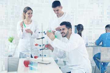 Medical students working in modern scientific laboratory