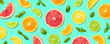 Colorful pattern of citrus fruit slices and mint leaves