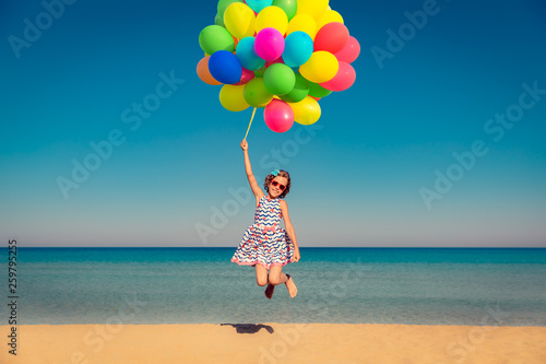 Child enjoys a summer vacation at the sea