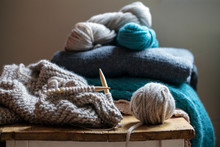 Balls Of Wool And Knitting Needles