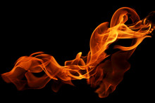Movement Of Fire Flames Isolated On Black Background.