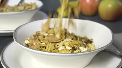 Sticker - Pouring muesli cereal into a bowl