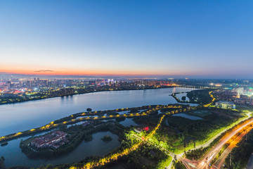 Canvas Print - cityscape and skyline of downtown near water of chongqing at night