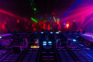 Wall Mural - DJ mixer controller Board for professional mixing of electronic music in a nightclub