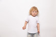 © yana136 - child playing with toy airplane against on a white background. concept dreams of flight
